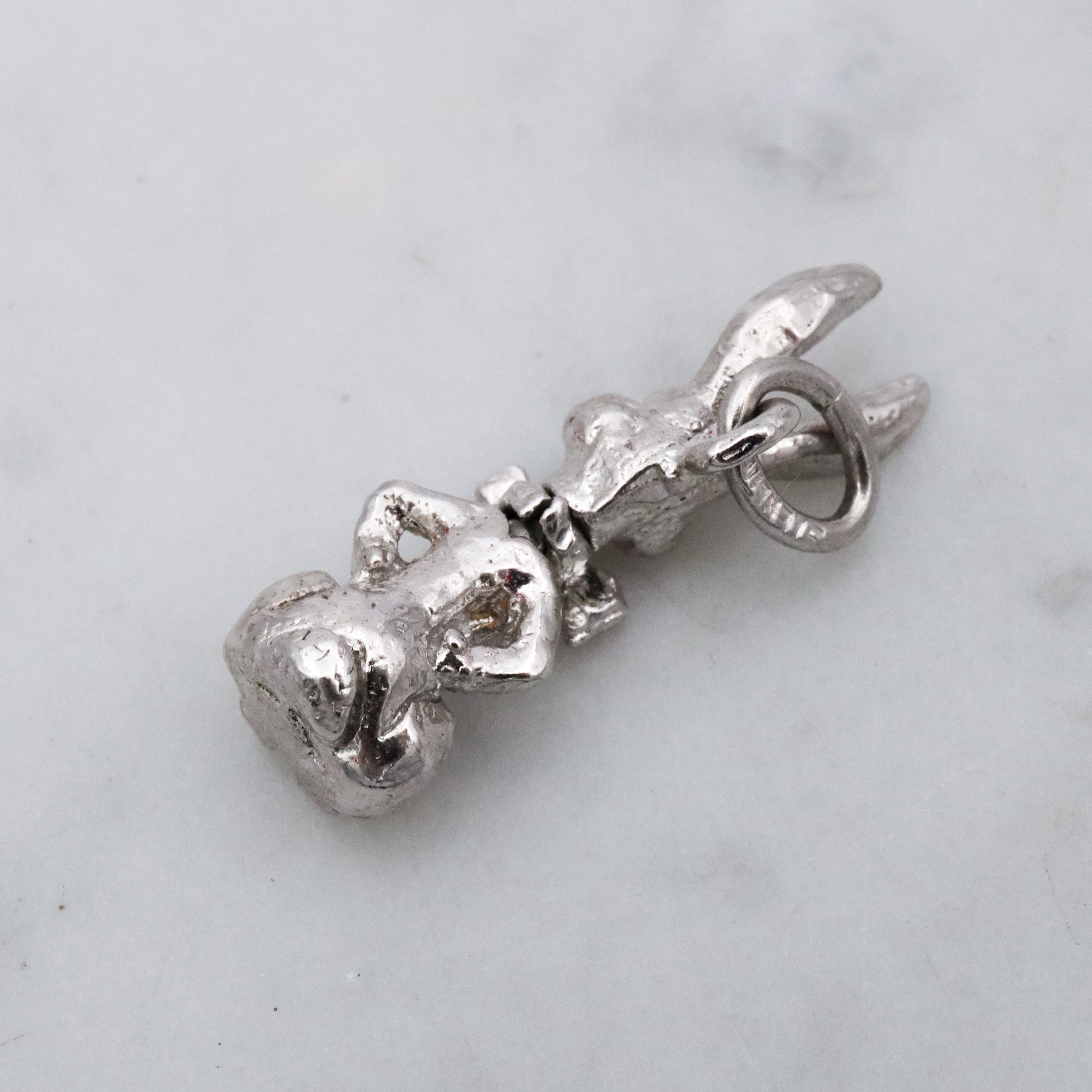 Vintage sterling seated bunny with red bowtie & nodding head